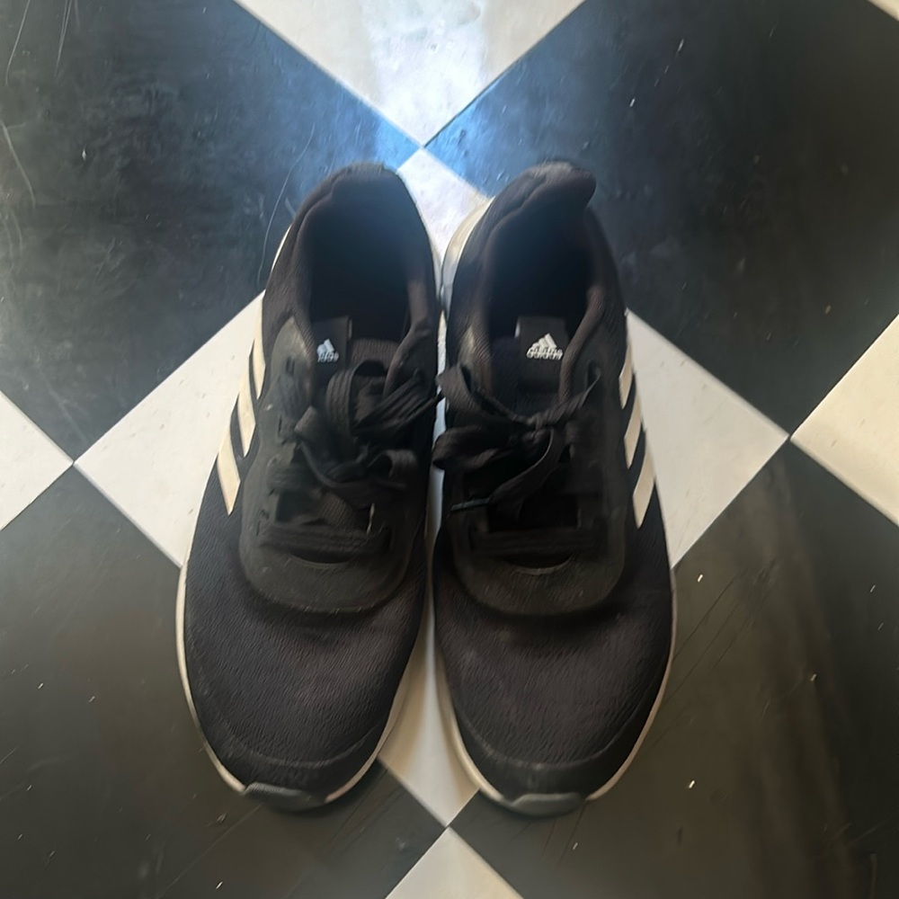 SOLD. Adidas black running shoes